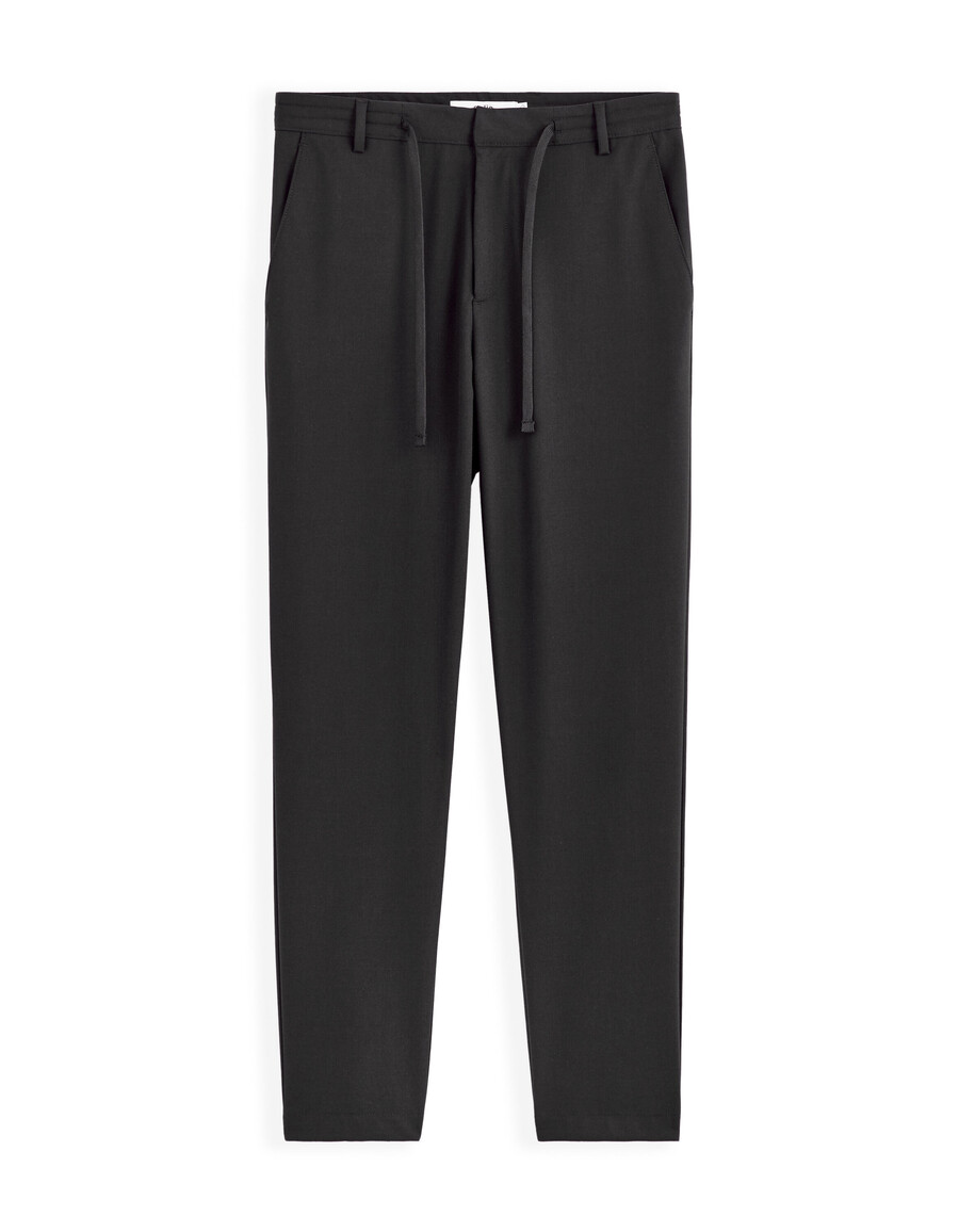 pantalones negros ajustados y elásticos hasta el tobillo para todo el día