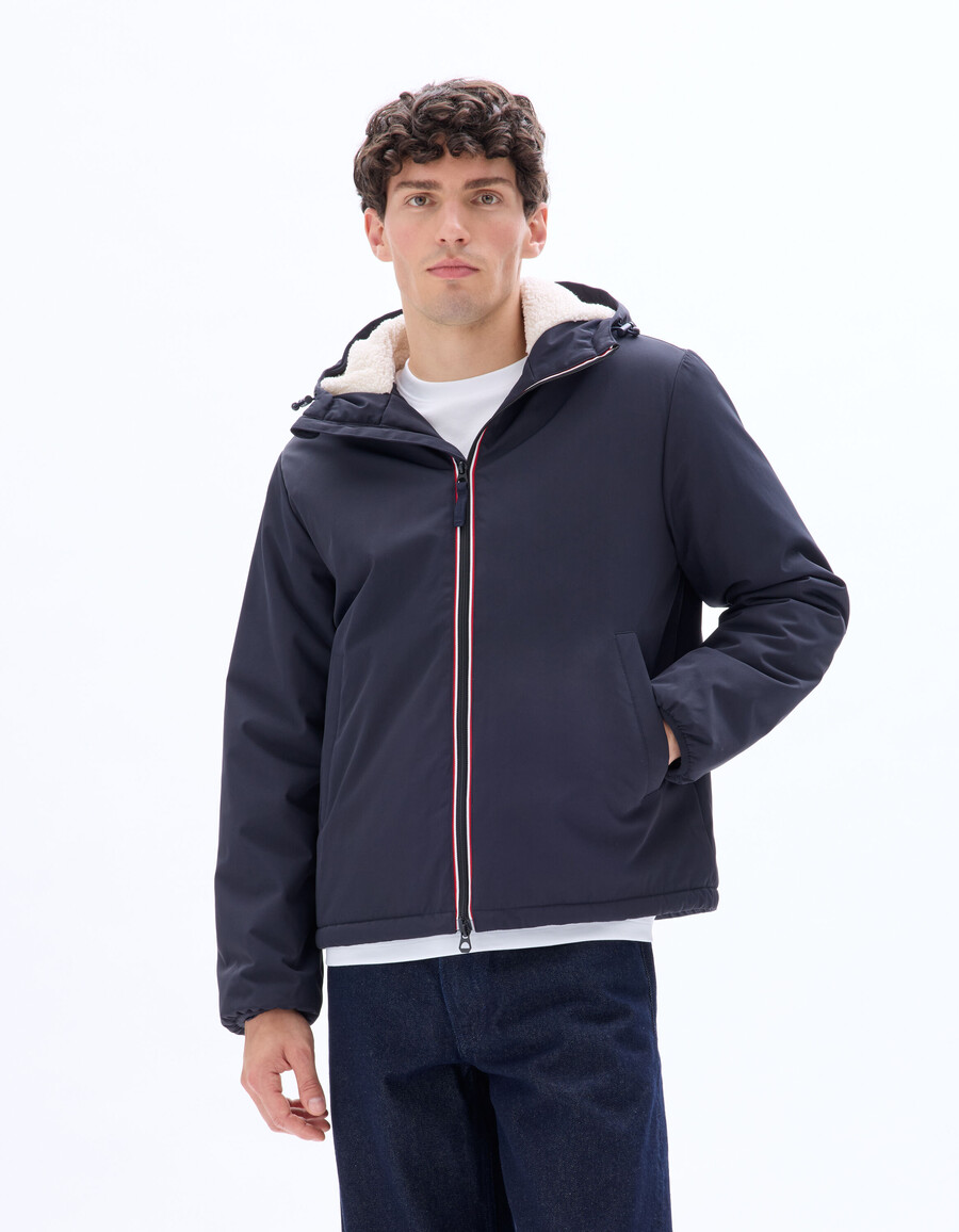chaqueta drycore con capucha repelente al agua y forrada de sherpa