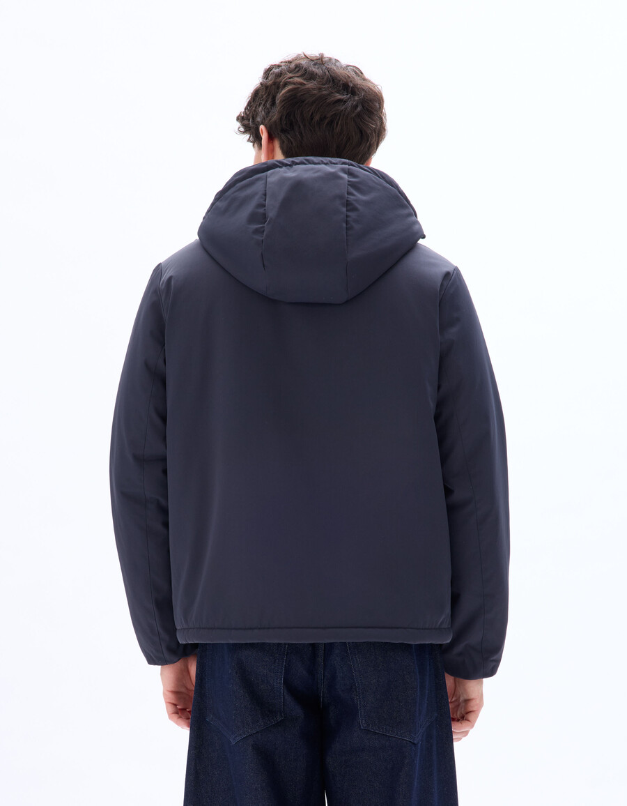 chaqueta drycore con capucha repelente al agua y forrada de sherpa