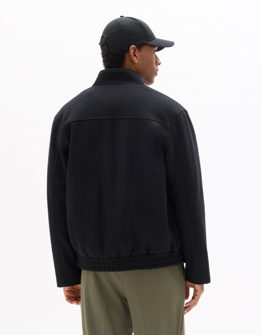chaqueta negra de lana mezclada con cuello alto