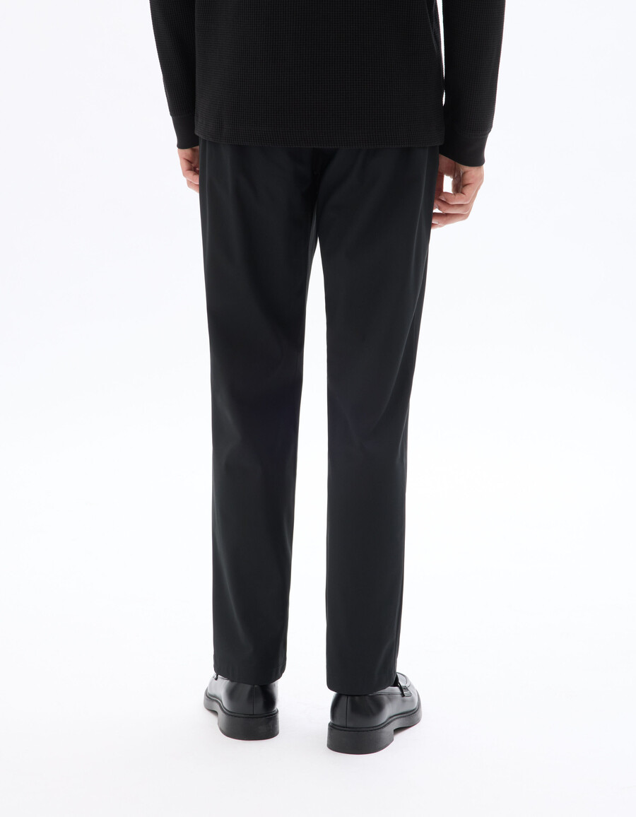 pantalones chinos de punto técnico elástico