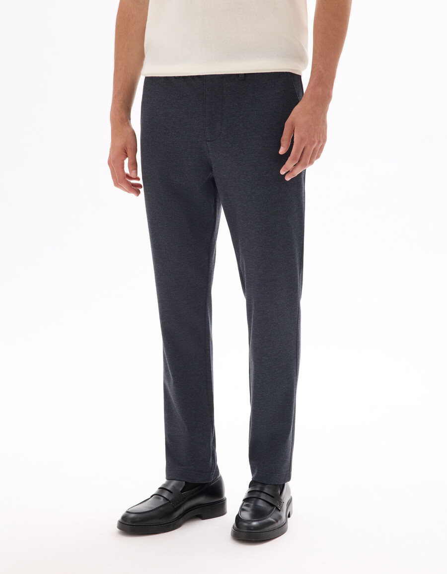 pantalones chinos ajustados de jersey