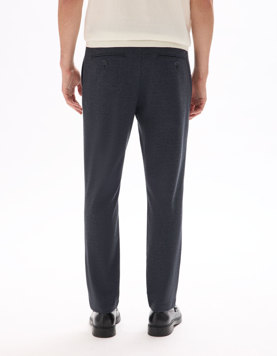 pantalones chinos ajustados de jersey